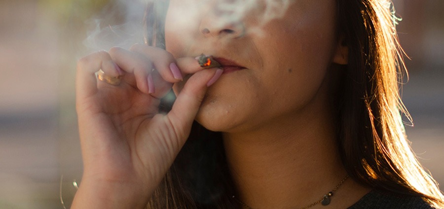 woman smoking weed joint. buy weed online in Canada. buy weed edibles online.